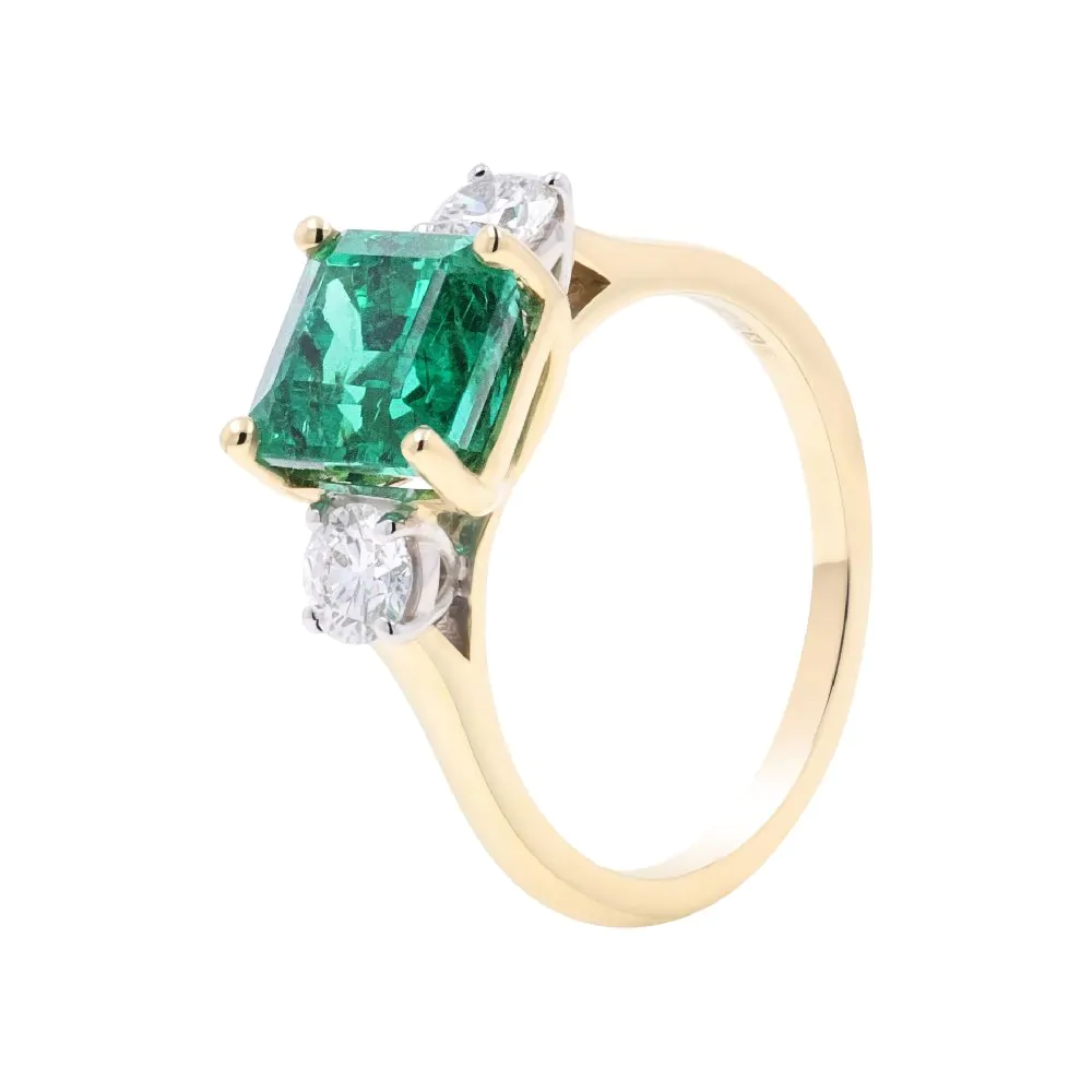 18ct Yellow & White Gold 2.61ct Emerald and 0.50ct Diamond Three Stone Ring