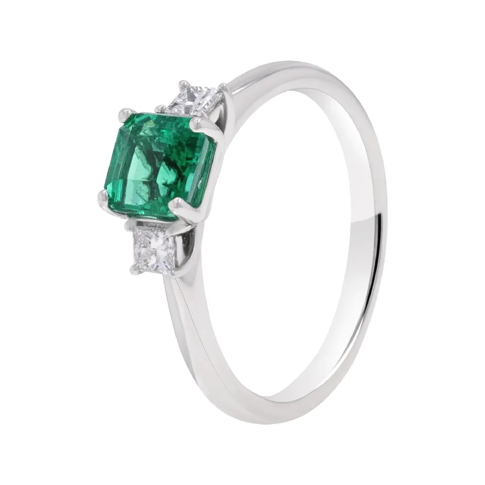 Platinum 0.93ct Emerald and 0.19ct Diamond Three Stone Ring