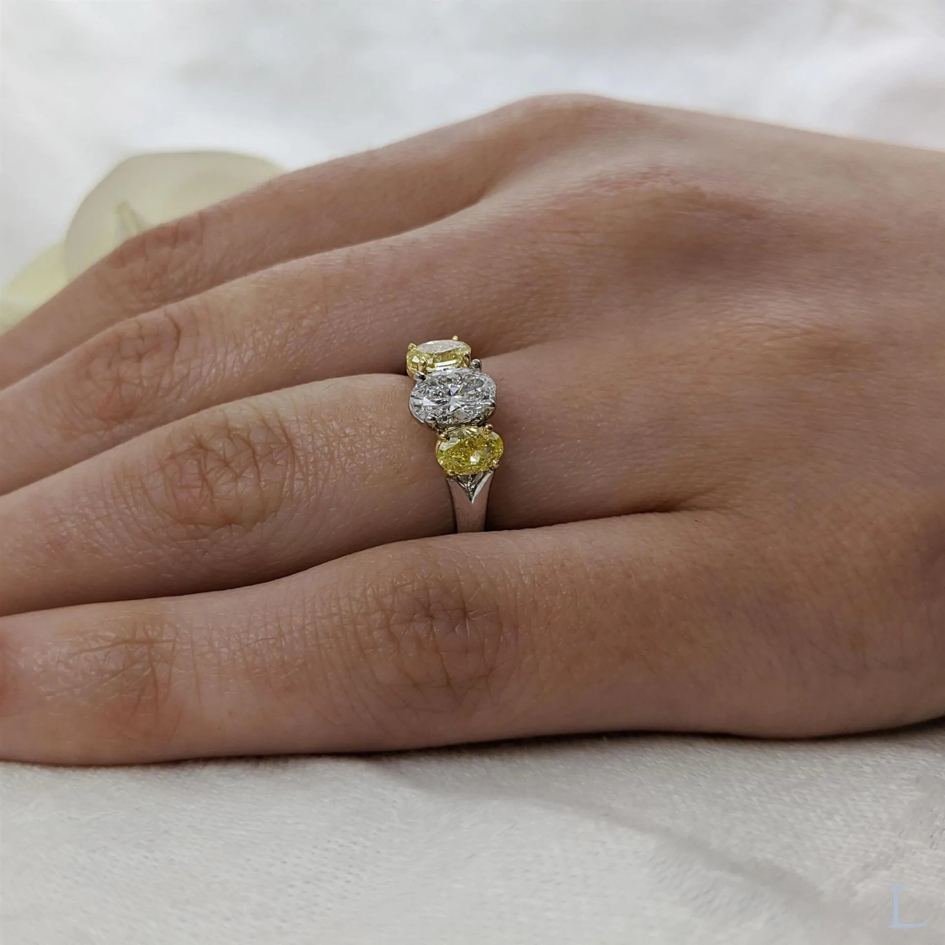 Platinum & 18ct Yellow Gold 1.00ct F SI1 Oval Cut Diamond and Yellow Diamond Three Stone Ring