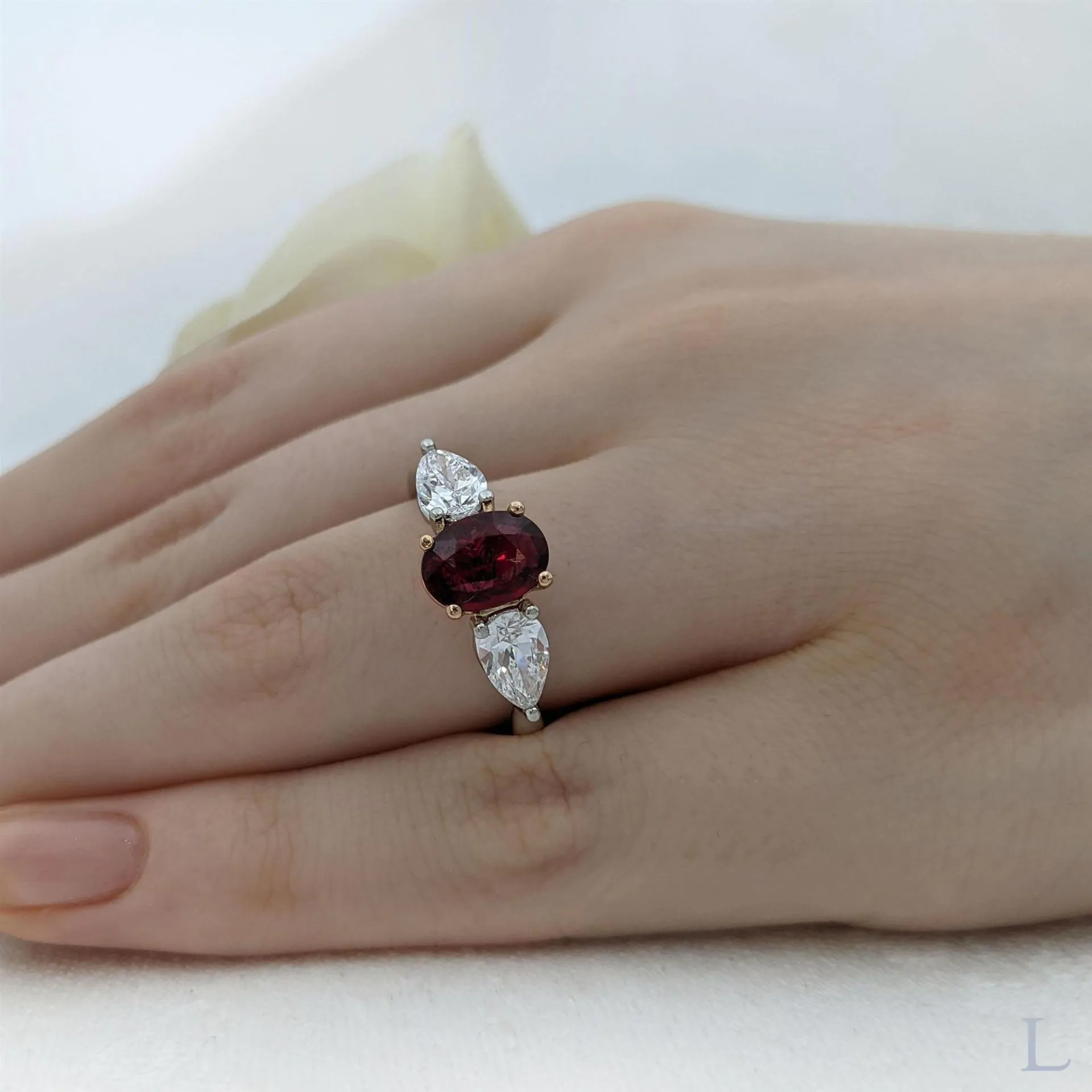 Platinum & 18ct Rose Gold 1.20ct Oval Cut Ruby and Diamond Three Stone Ring