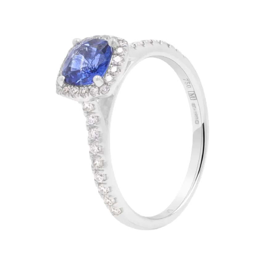 18ct White Gold 0.84ct Sapphire and 0.29ct Diamond Halo Ring