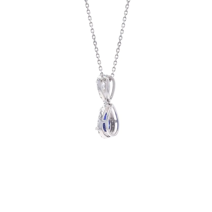 18ct White Gold 0.74ct Sapphire and 0.37ct Diamond Halo Pendant and Chain