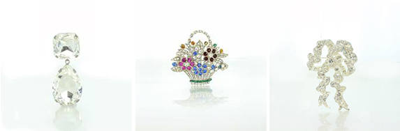 The Cullinan III and IV brooch,  the flower basket brooch and the Lover's knot brooch.