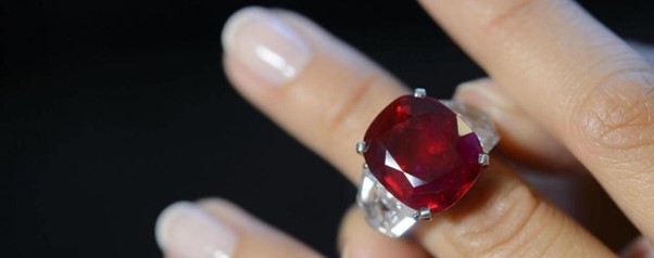 The Rare Ruby Presented in a ring being worn