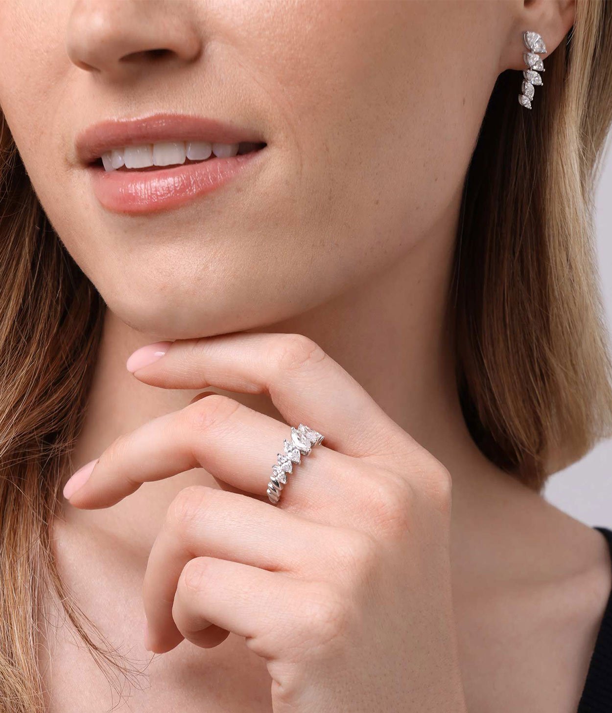 A model wears a lab-grown diamond set with marquise cut lab grown diamonds.