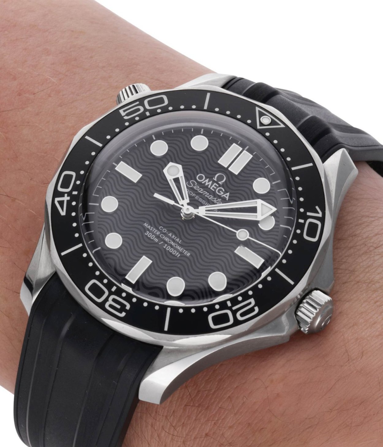 Close-up of 42mm OMEGA watch with a stainless steel case and a black rubber strap, beside text promoting expert top pre-owned picks.