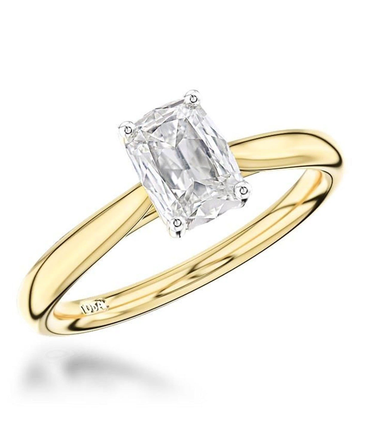 A cushion cut diamond engagement ring, with an 18ct yellow gold band and platinum claws.