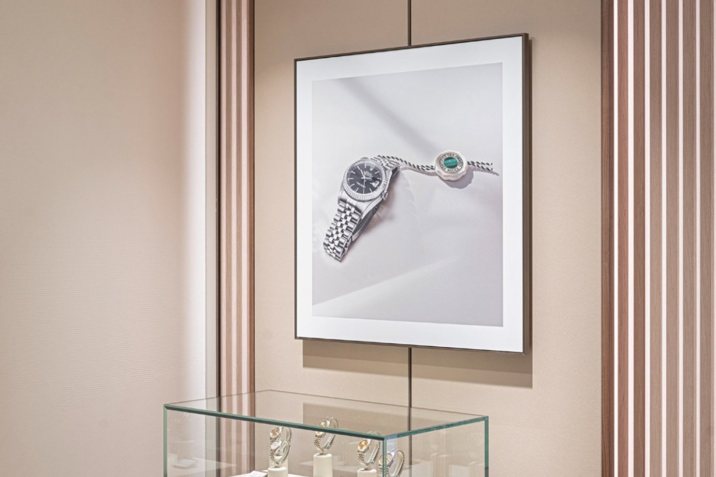 An image of a Rolex Certified Pre-Owned watch hanging in a Rolex authorised showroom
