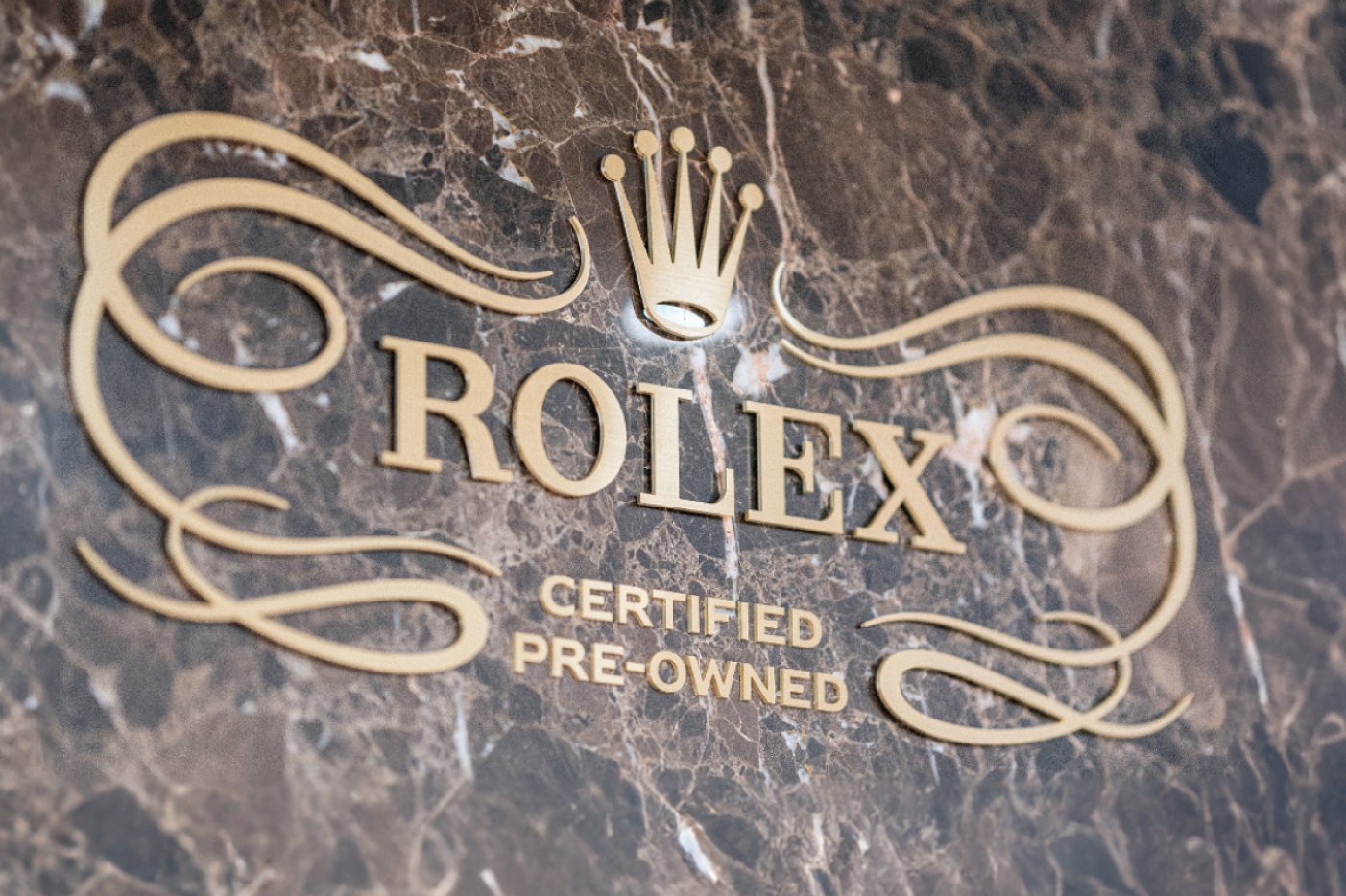 Rolex Certified Pre-Owned Logo Plaque in showroom at Laings