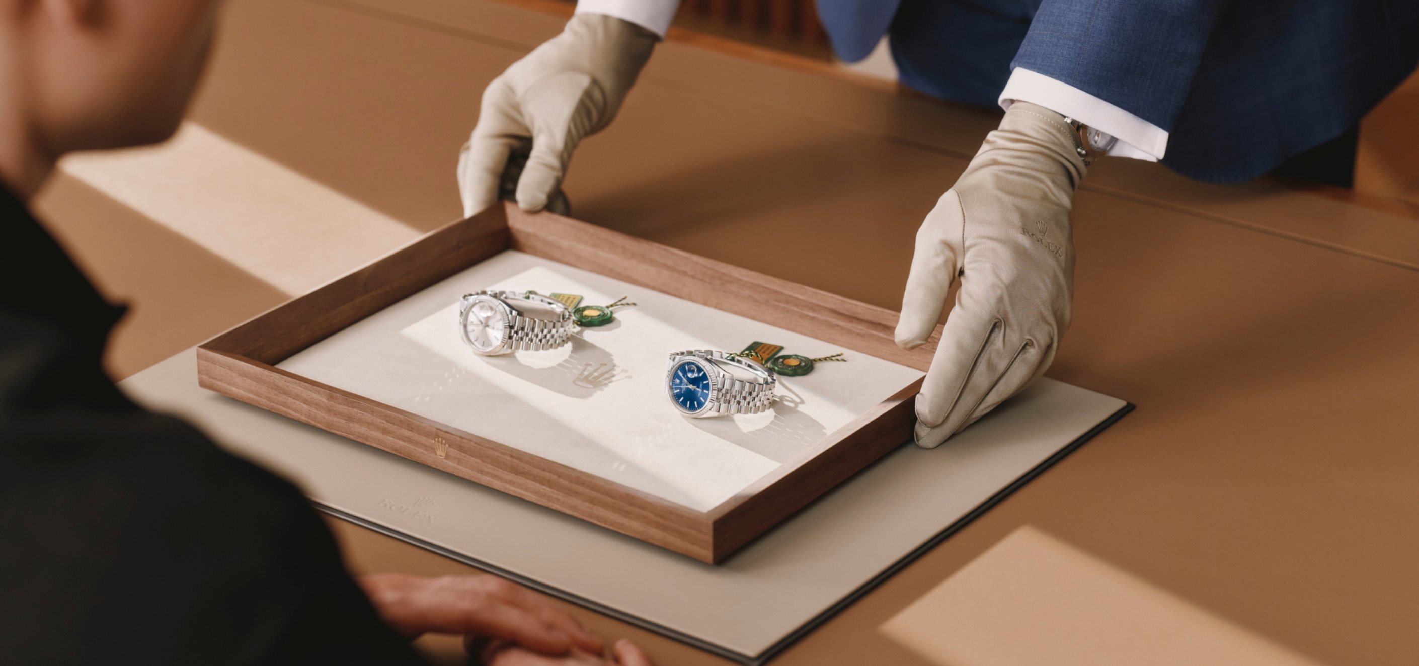 Presenting a Rolex Watch to a Client in Our Showrooms