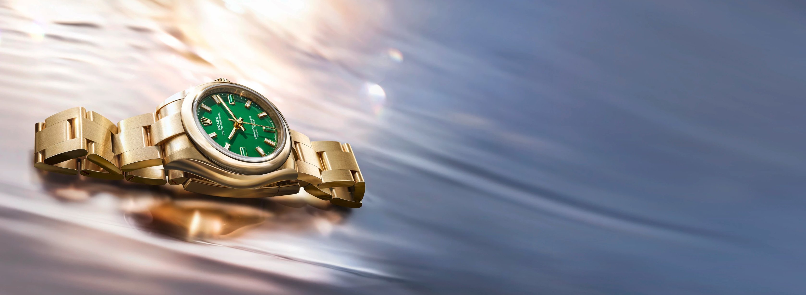 Rolex Oyster Perpetual Watch with a green dial