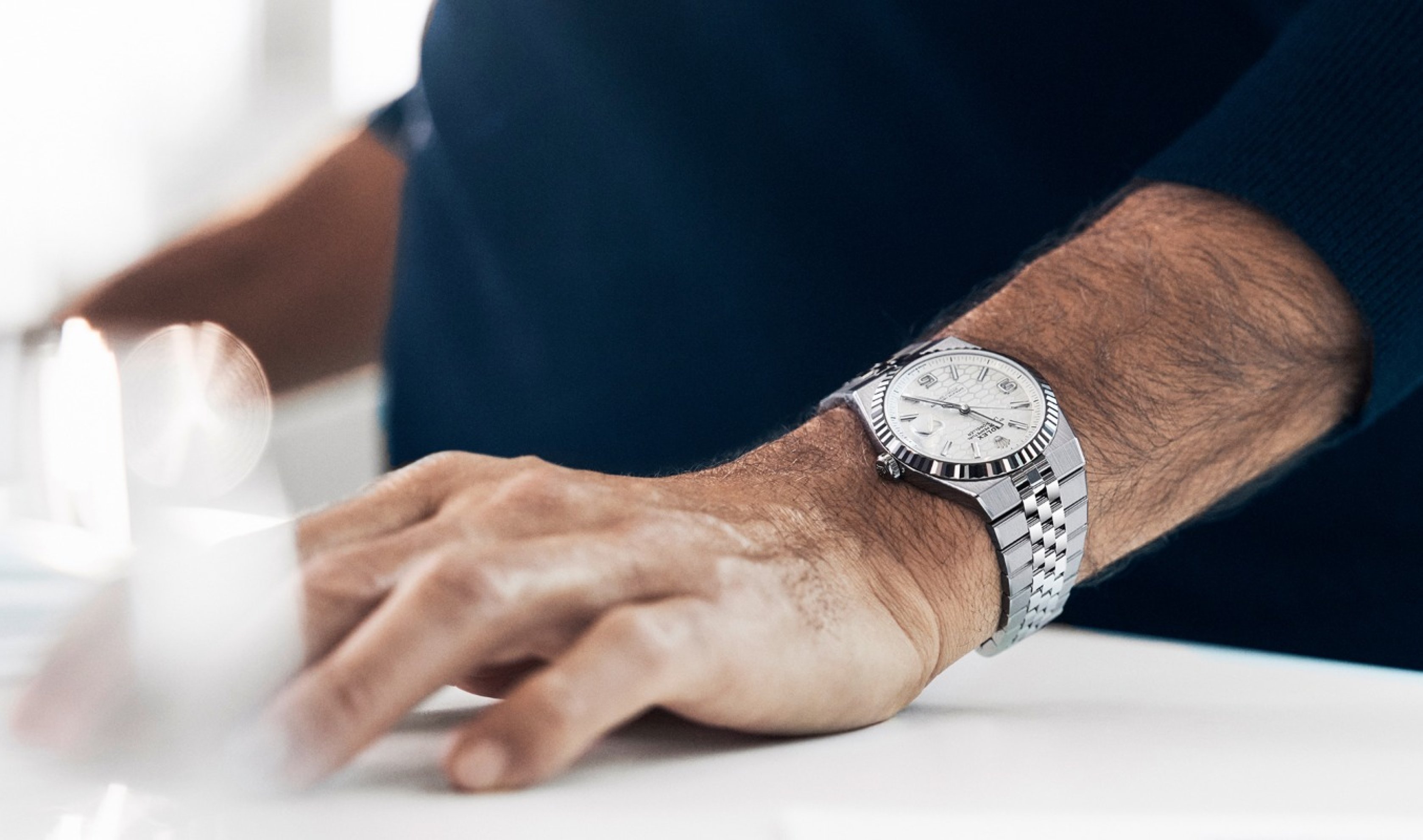 Roger Federer wearing the Land-Dweller in Oystersteel