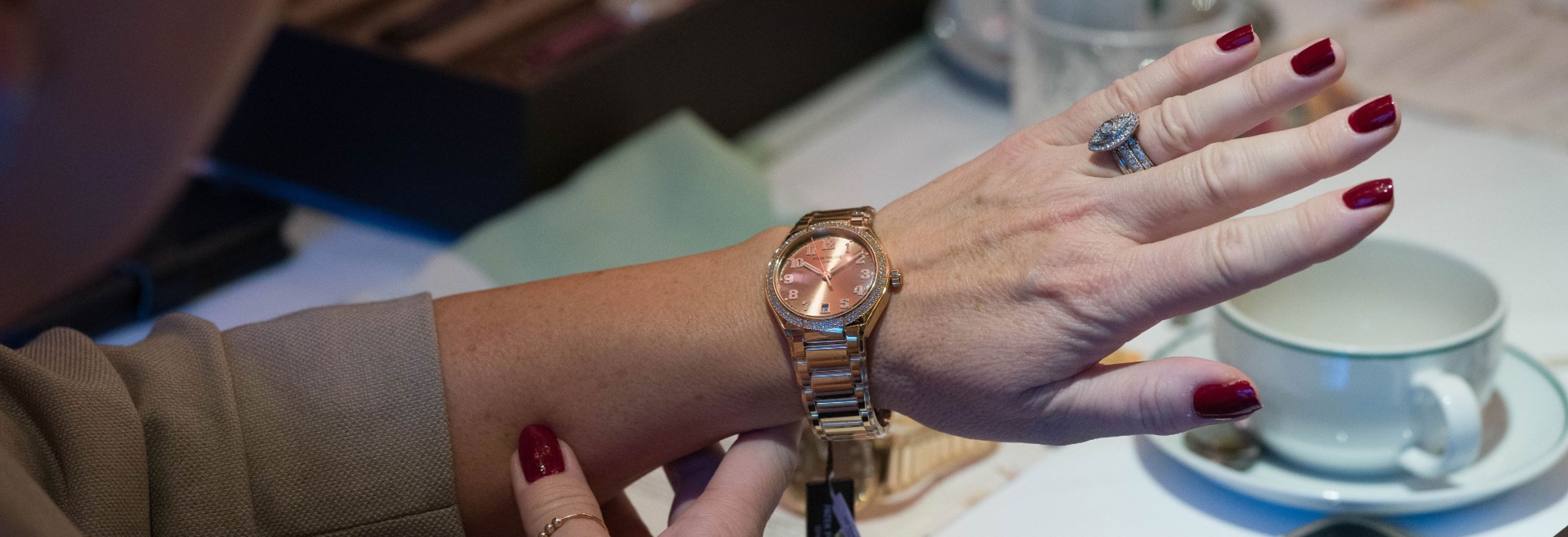 Trying on the Patek Philippe ladies watch, the Twenty~4, in rose gold with a salmon pink dial