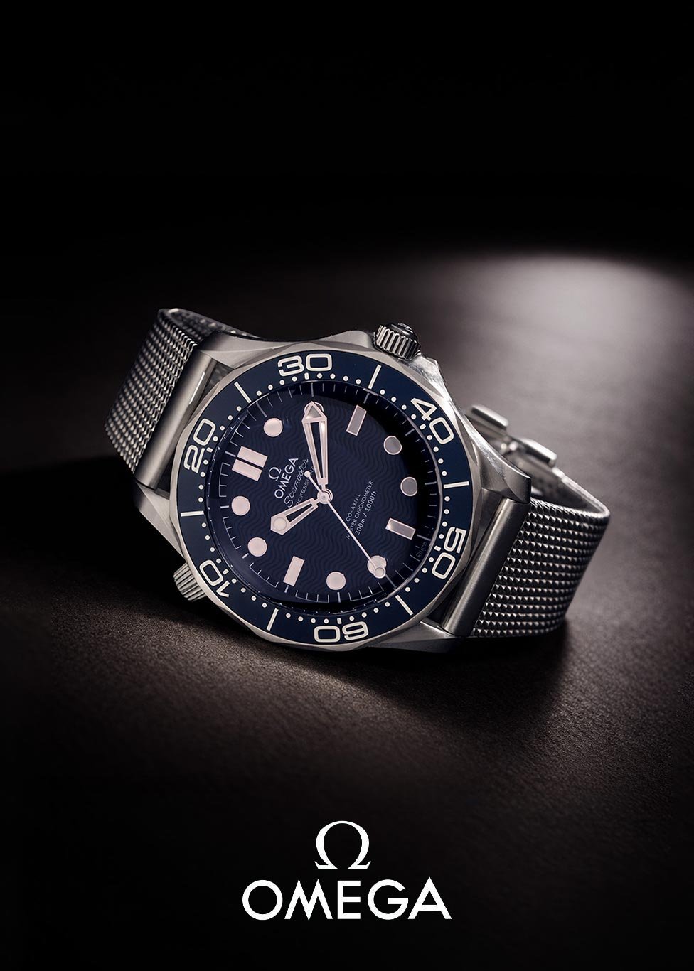A pre-owned OMEGA Seamaster Diver timepiece with a blue dial and steel bracelet and case
