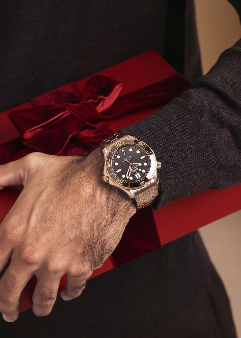 Christmas gifts for men featuring a OMEGA watch