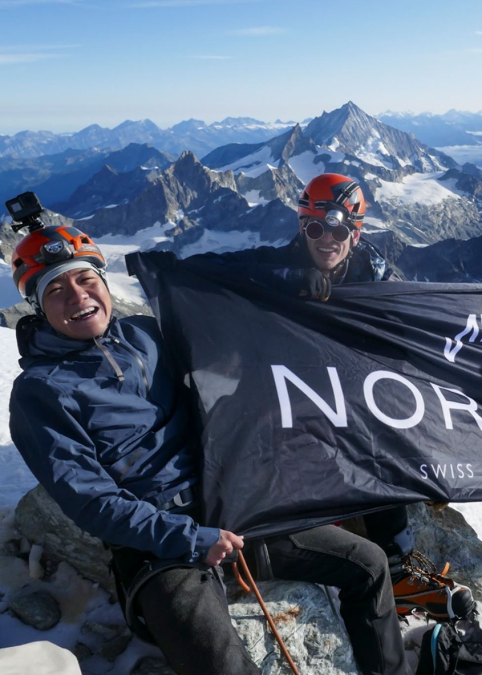NORQAINERS celebrating reaching the top of the summit on the NORQAIN challenge.